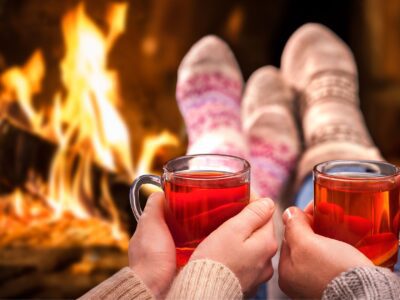 How To Keep Warm by a Fireplace Drinking Tea and Wearing Wool Socks.